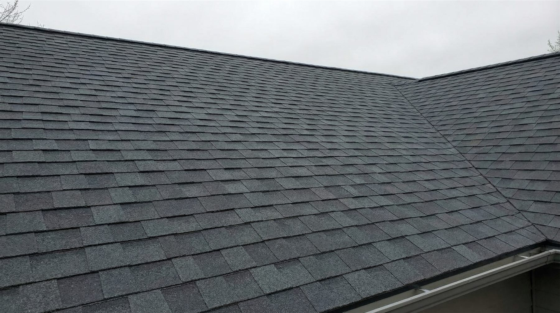 New architectural shingle roof after replacement by Raleigh Roof Pro
