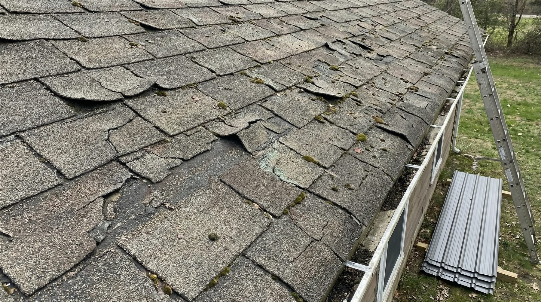 Old worn shingles before architectural shingle upgrade - Durham, NC